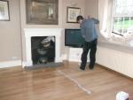 Floor sanding manchester - Woof floor being laquered after final fine sanding