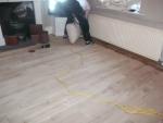 Floor sanding Manchester - Edges of the wood floor being sanded